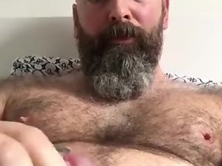 Pierced papa bear cums on his big belly